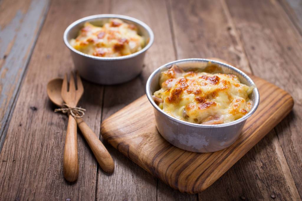 Grated potatoes go wonderfully in this cheese sauce.